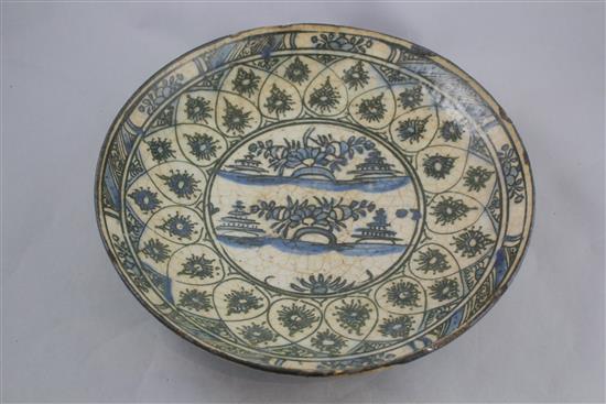 A Persian fritware dish, Safavid, 17th century, 31.5cm